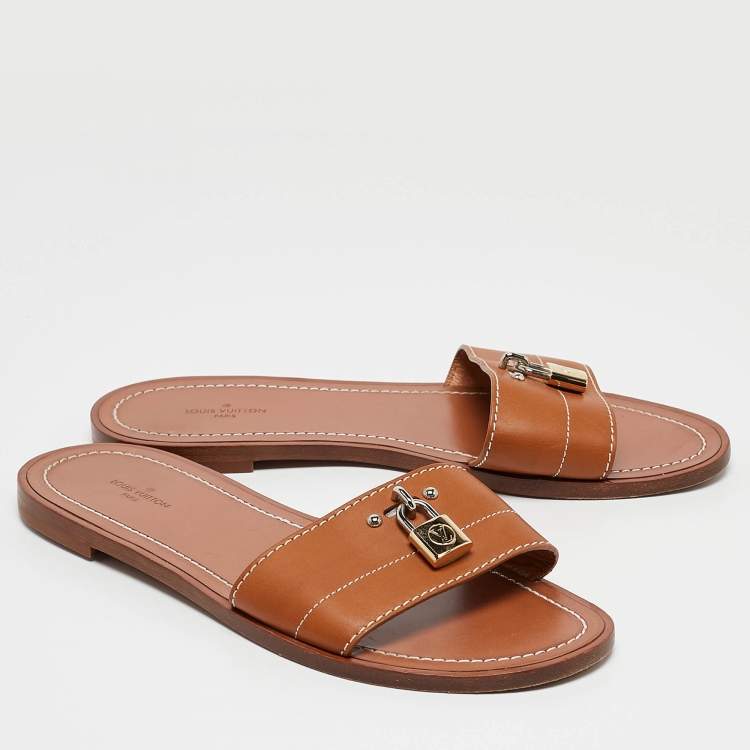 Pre Owned Louis Vuitton Brown Leather Lock It Flat Slides Size 38