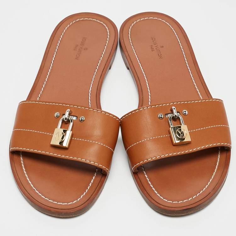 Pre Owned Louis Vuitton Brown Leather Lock It Flat Slides Size 38