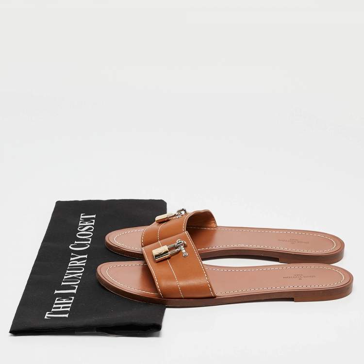 Pre Owned Louis Vuitton Brown Leather Lock It Flat Slides Size 38