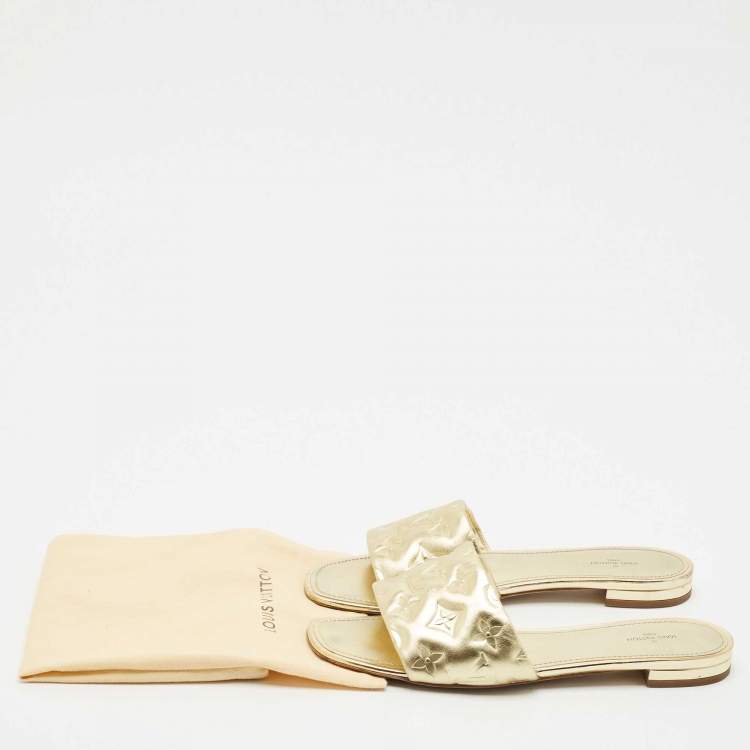 Pre Owned Louis Vuitton Gold Monogram Embossed Leather Revival Flat Slides Size 41