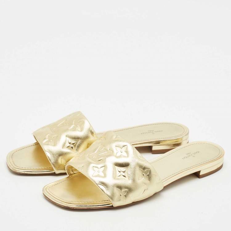 Pre Owned Louis Vuitton Gold Monogram Embossed Leather Revival Flat Slides Size 41