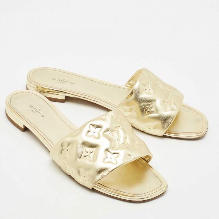 Pre Owned Louis Vuitton Gold Monogram Embossed Leather Revival Flat Slides Size 41