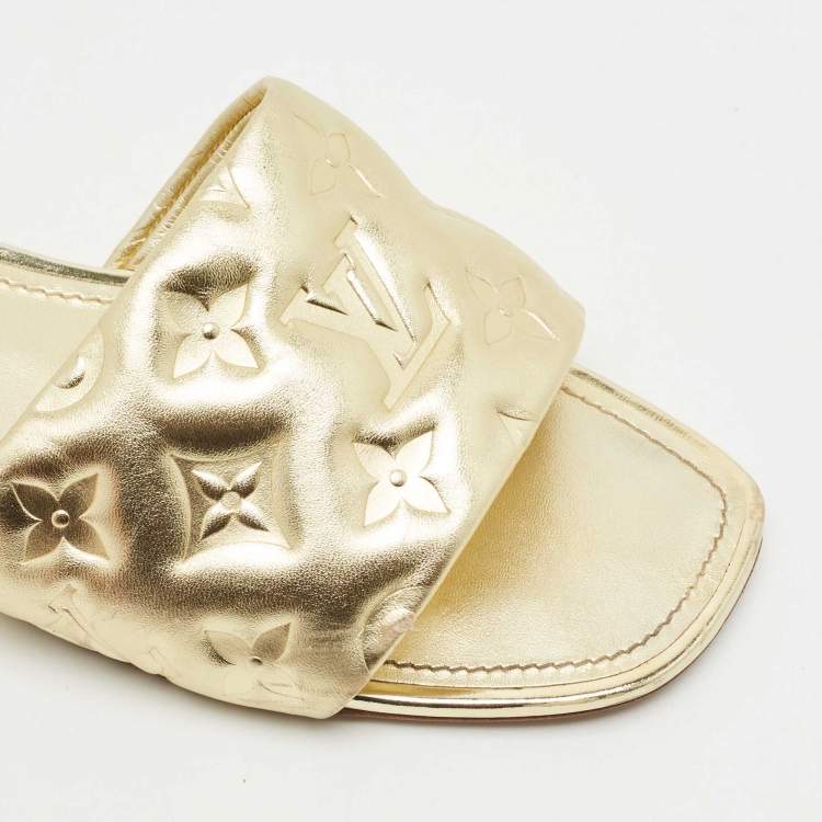 Pre Owned Louis Vuitton Gold Monogram Embossed Leather Revival Flat Slides Size 41