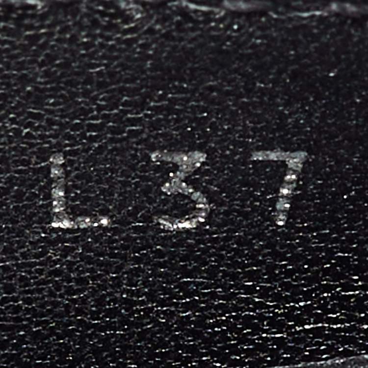 Pre Owned Louis Vuitton Black Monogram Empreinte Leather Gloria Loafers Size 37.5