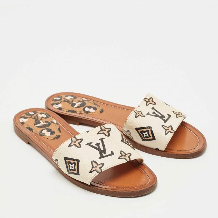 Pre Owned Louis Vuitton Cream Monogram Embossed Leather Revival Flat Slides Size 37