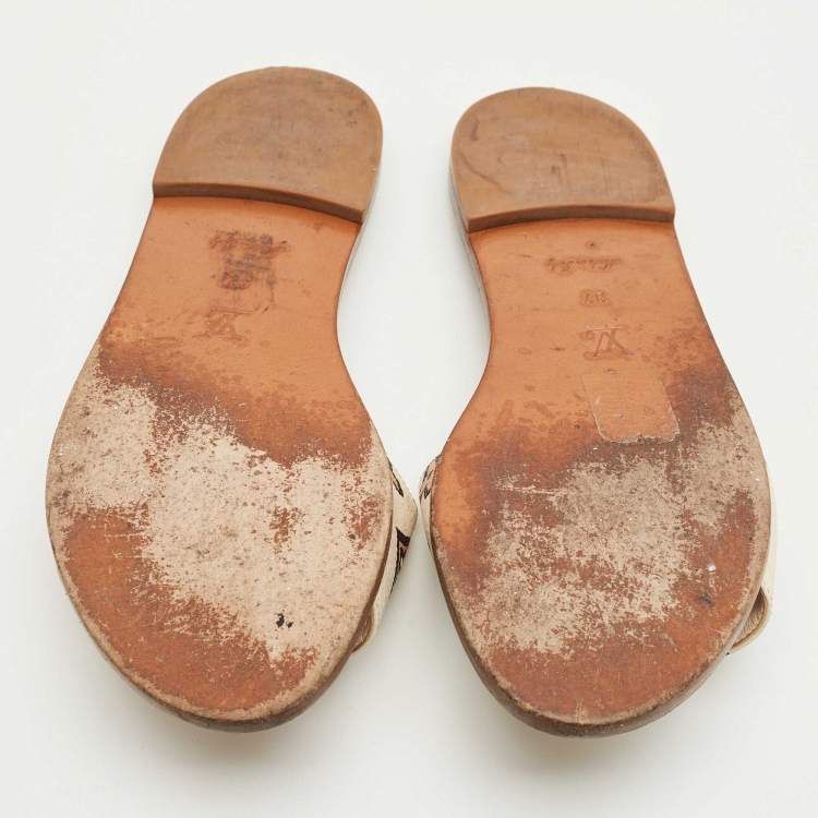Pre Owned Louis Vuitton Cream Monogram Embossed Leather Revival Flat Slides Size 37