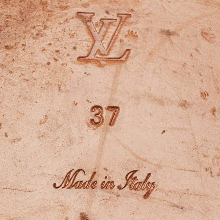 Pre Owned Louis Vuitton Cream Monogram Embossed Leather Revival Flat Slides Size 37