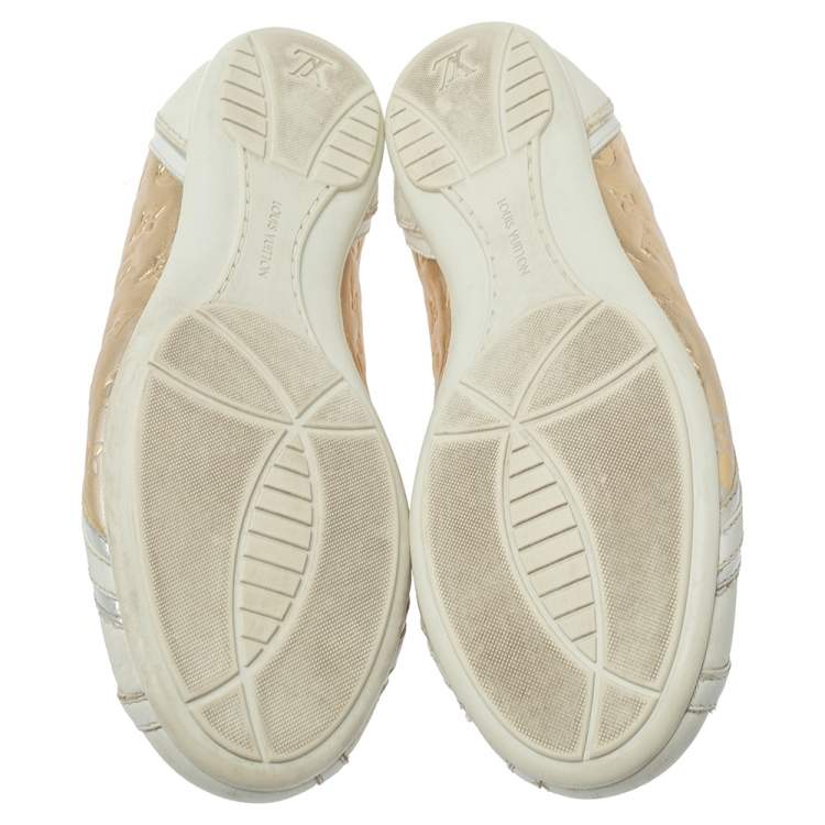 مملوكة مسبقًا Louis Vuitton White And Golden Leather Impulsion Sneaker Size 36.5