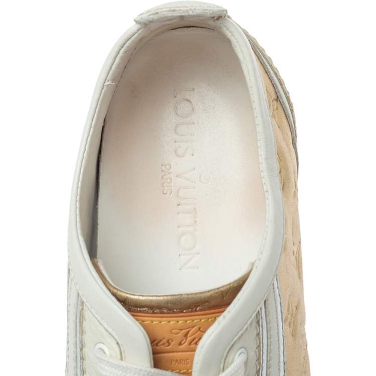 مملوكة مسبقًا Louis Vuitton White And Golden Leather Impulsion Sneaker Size 36.5