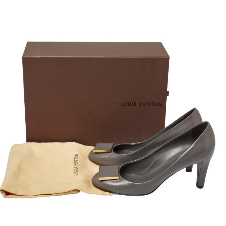 Pre Owned Louis Vuitton Grey Leather Logo Embellished Pumps Size 38