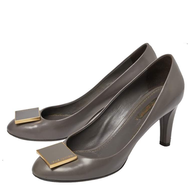 Pre Owned Louis Vuitton Grey Leather Logo Embellished Pumps Size 38