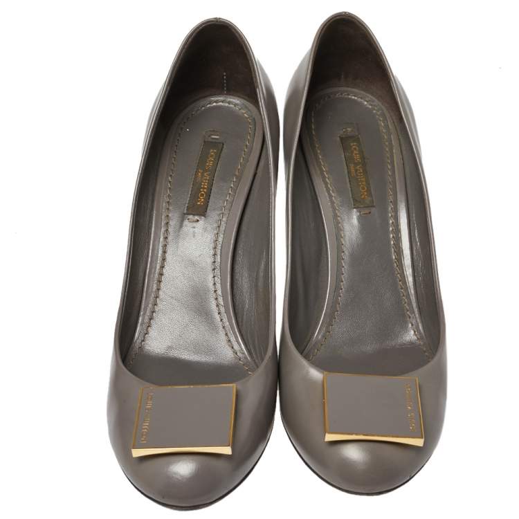 Pre Owned Louis Vuitton Grey Leather Logo Embellished Pumps Size 38