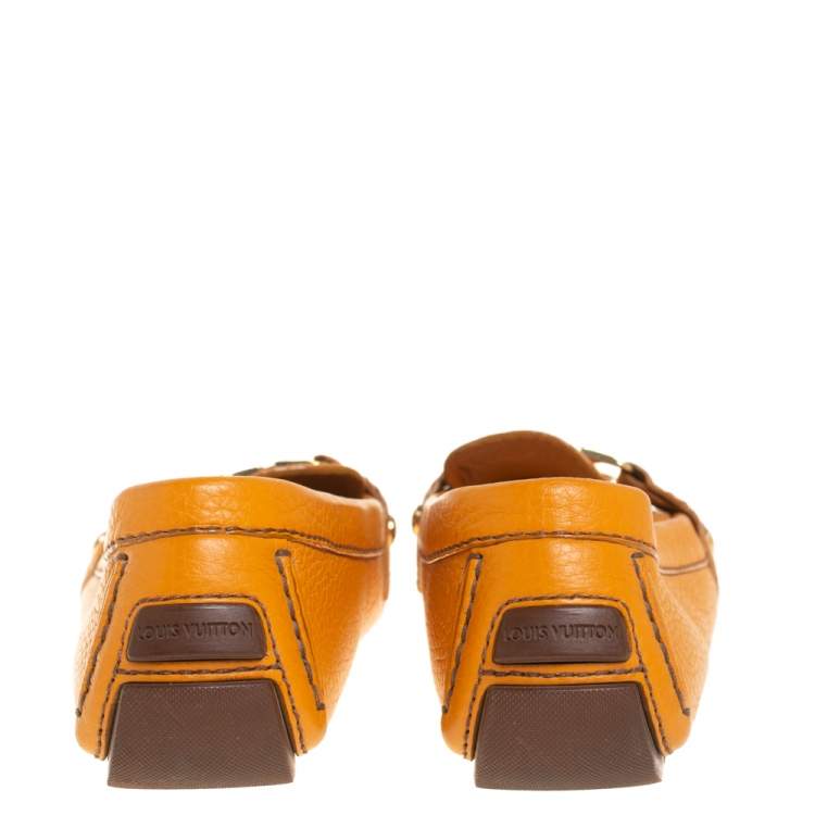 مملوكة مسبقًا Louis Vuitton Orange Leather Logo Embellished Driving Loafer Size 35.5