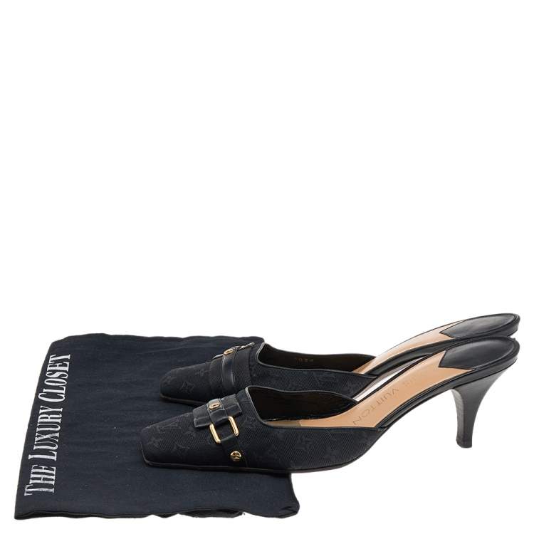 Pre Owned Louis Vuitton Black Monogram Embossed Canvas Slip On Mules Size 37.5