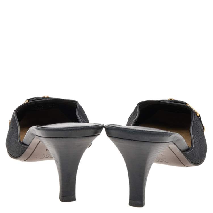 Pre Owned Louis Vuitton Black Monogram Embossed Canvas Slip On Mules Size 37.5