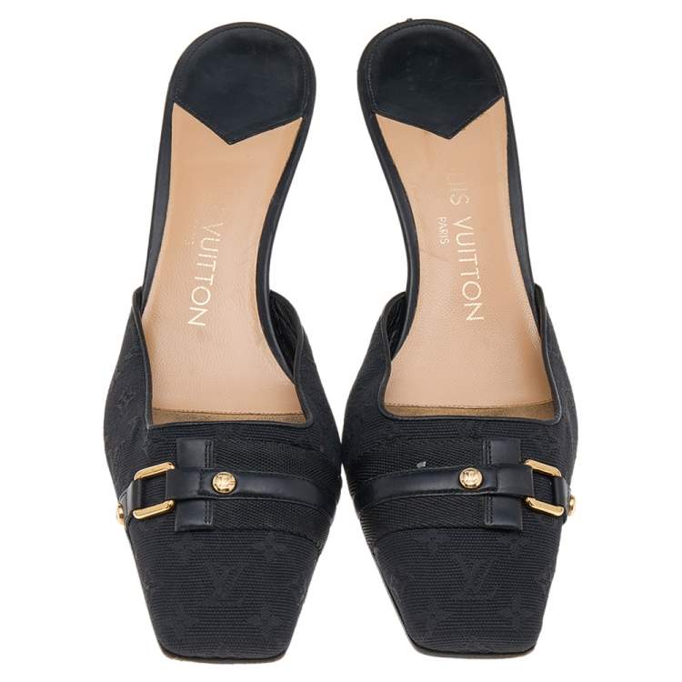 Pre Owned Louis Vuitton Black Monogram Embossed Canvas Slip On Mules Size 37.5