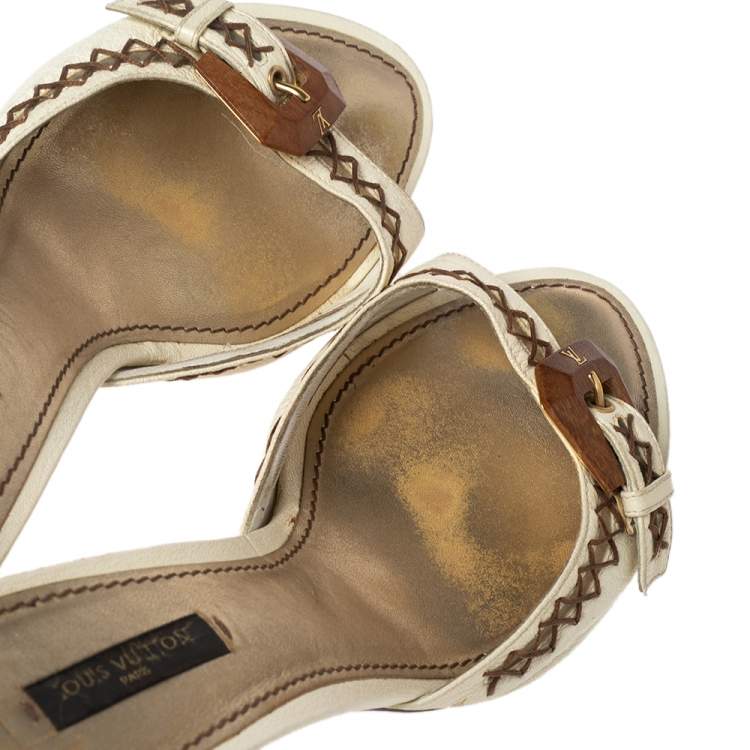 Pre Owned Louis Vuitton Cream Leather Buckle and Whip Stitch Detail Slide Sandals Size 41