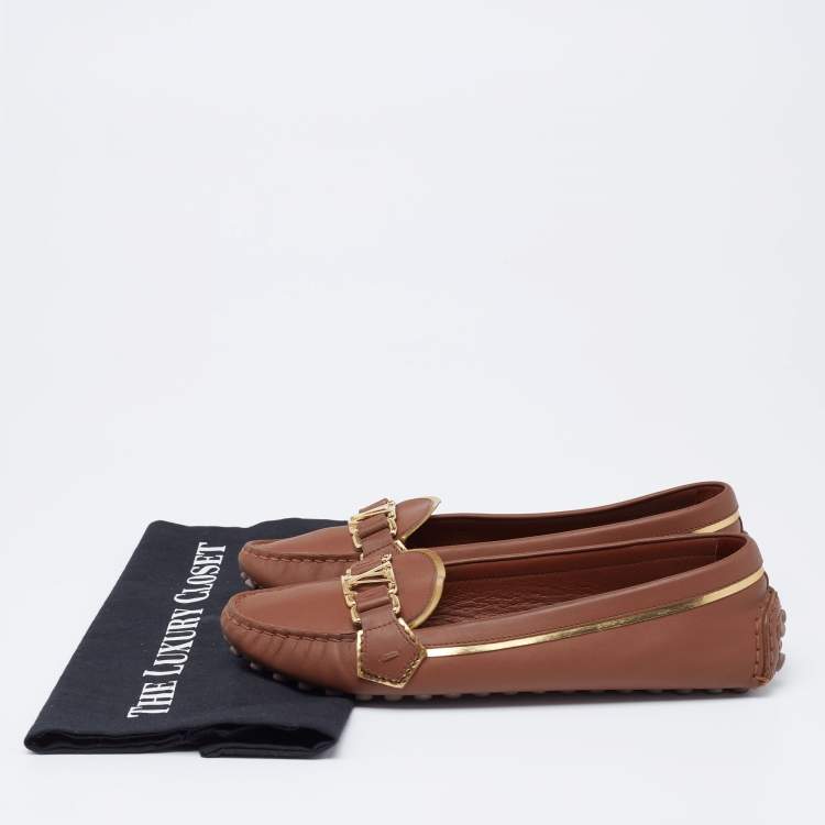 Pre Owned Louis Vuitton Brown Leather Metal Logo Slip On Loafers Size 38