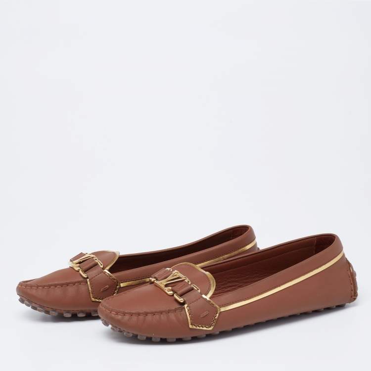 Pre Owned Louis Vuitton Brown Leather Metal Logo Slip On Loafers Size 38