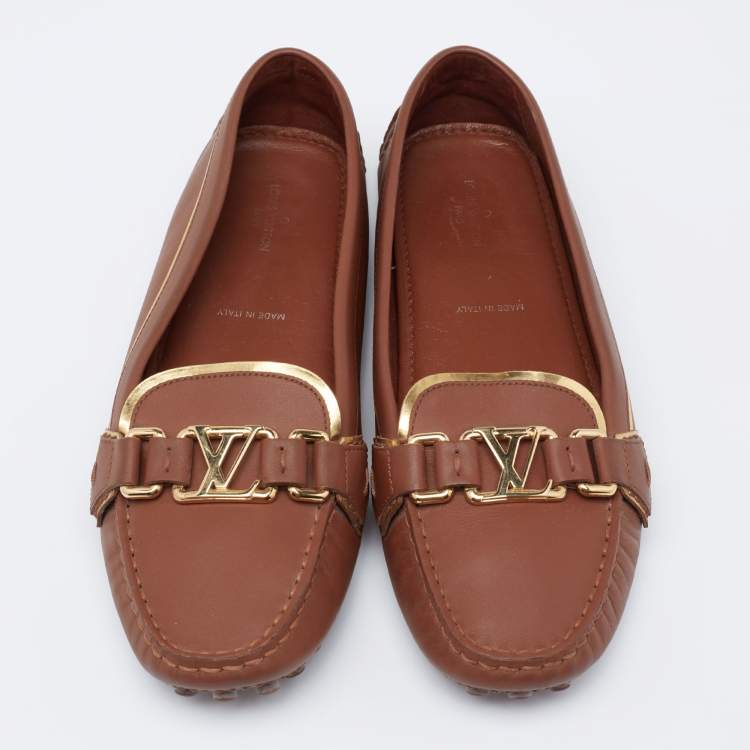 Pre Owned Louis Vuitton Brown Leather Metal Logo Slip On Loafers Size 38
