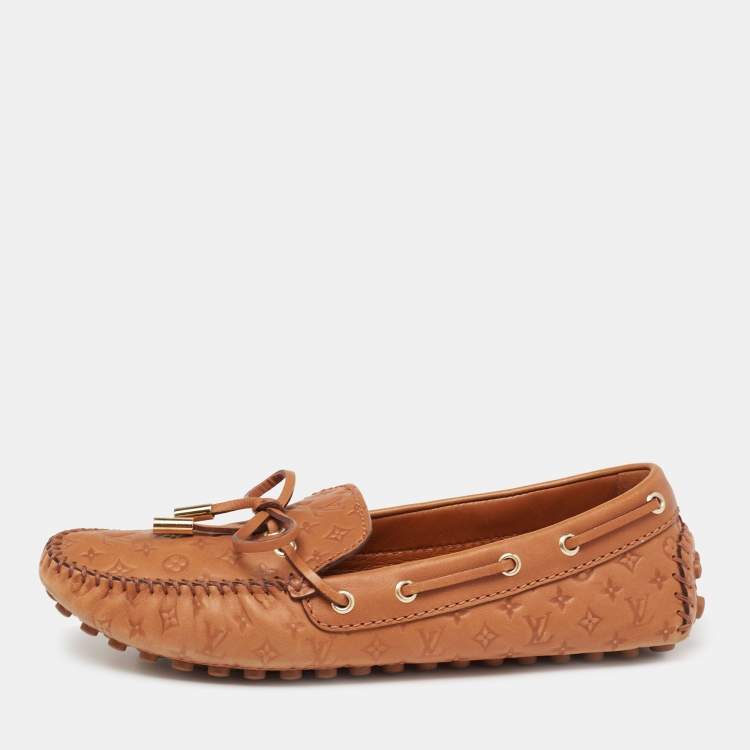 Pre Owned Louis Vuitton Tan Monogram Empreinte Leather Gloria Loafers Size 37.5