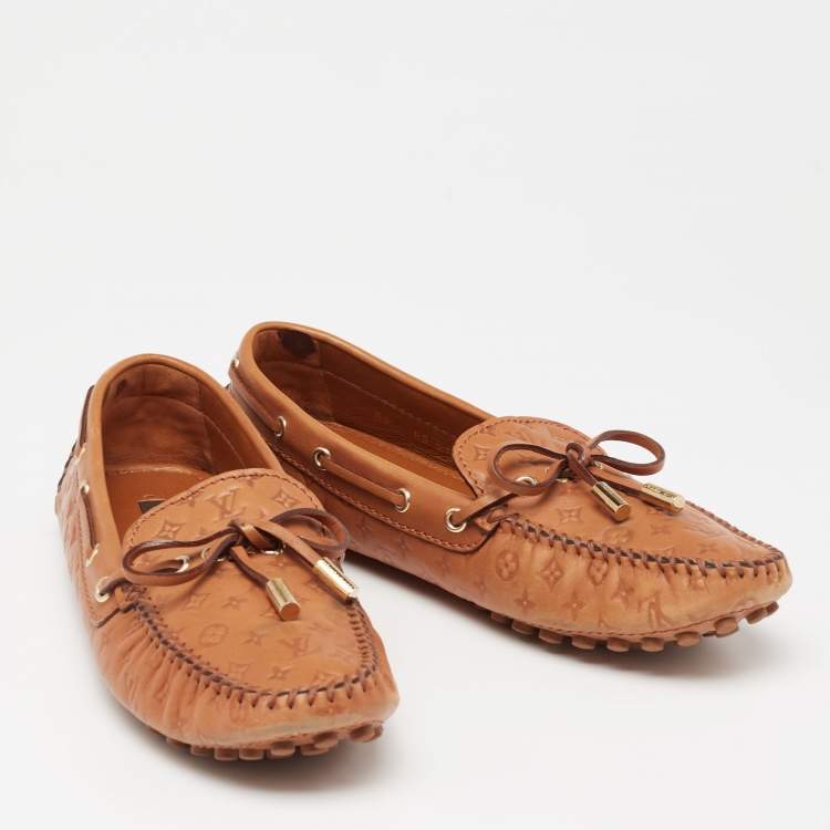 Pre Owned Louis Vuitton Tan Monogram Empreinte Leather Gloria Loafers Size 37.5