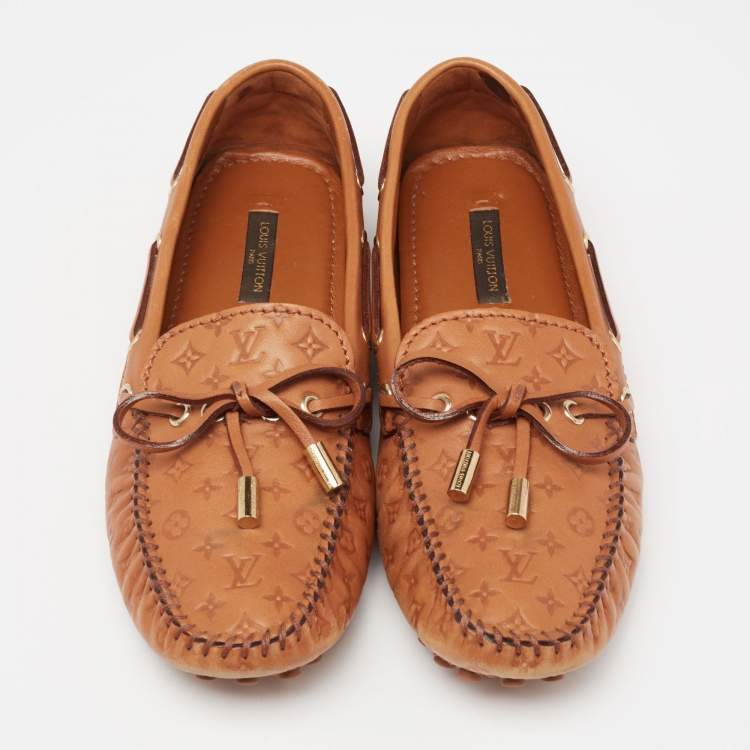 Pre Owned Louis Vuitton Tan Monogram Empreinte Leather Gloria Loafers Size 37.5