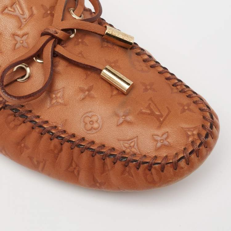 Pre Owned Louis Vuitton Tan Monogram Empreinte Leather Gloria Loafers Size 37.5