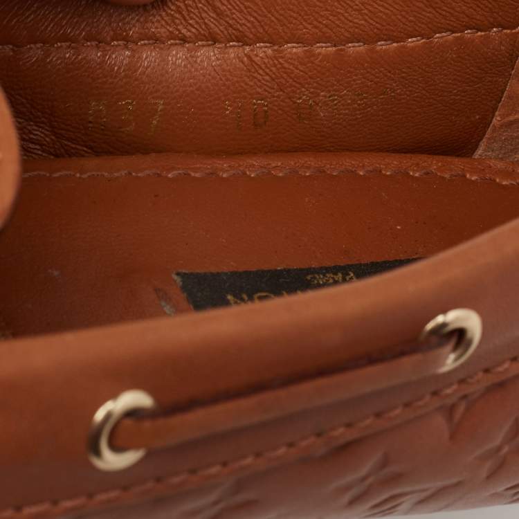 Pre Owned Louis Vuitton Tan Monogram Empreinte Leather Gloria Loafers Size 37.5