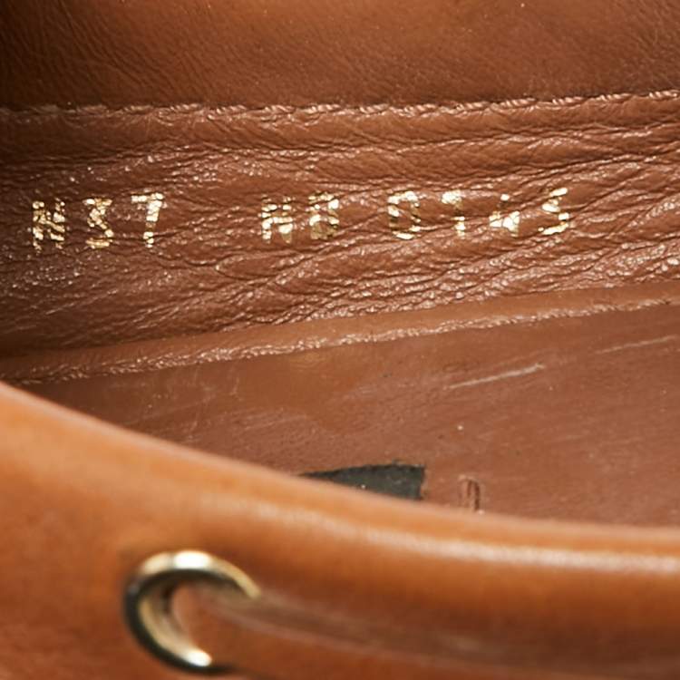 Pre Owned Louis Vuitton Brown Monogram Empreinte Leather Gloria Loafers Size 37