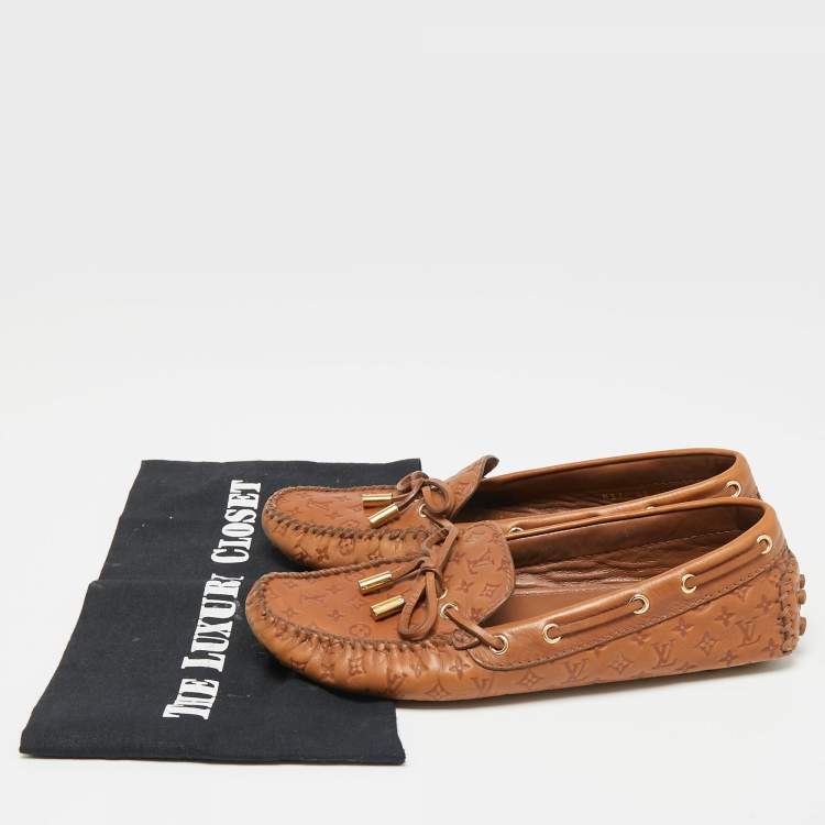 Pre Owned Louis Vuitton Brown Monogram Empreinte Leather Gloria Loafers Size 37