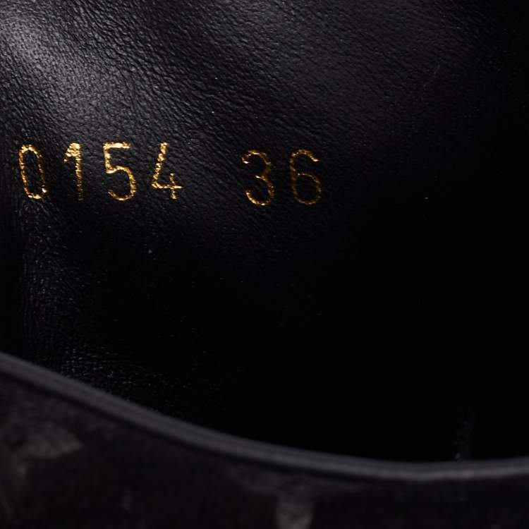 Pre Owned Louis Vuitton Black Monogram Empreinte Leather And Suede High Top Sneakers Size 36