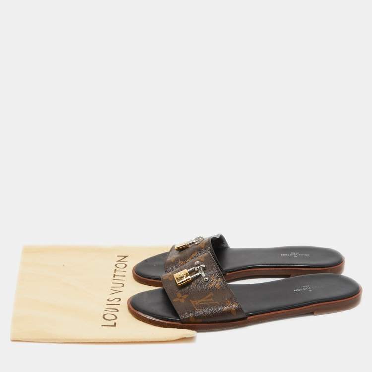 مملوكة مسبقًا Louis Vuitton Brown Monogram Canvas Lock It Flat Slides Size 37