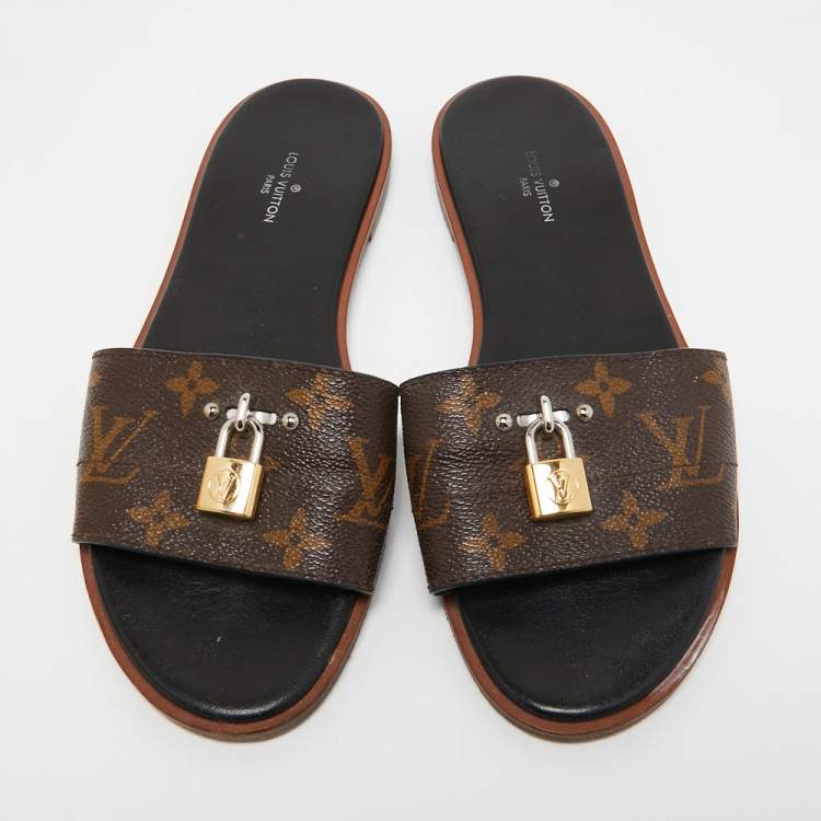 مملوكة مسبقًا Louis Vuitton Brown Monogram Canvas Lock It Flat Slides Size 37
