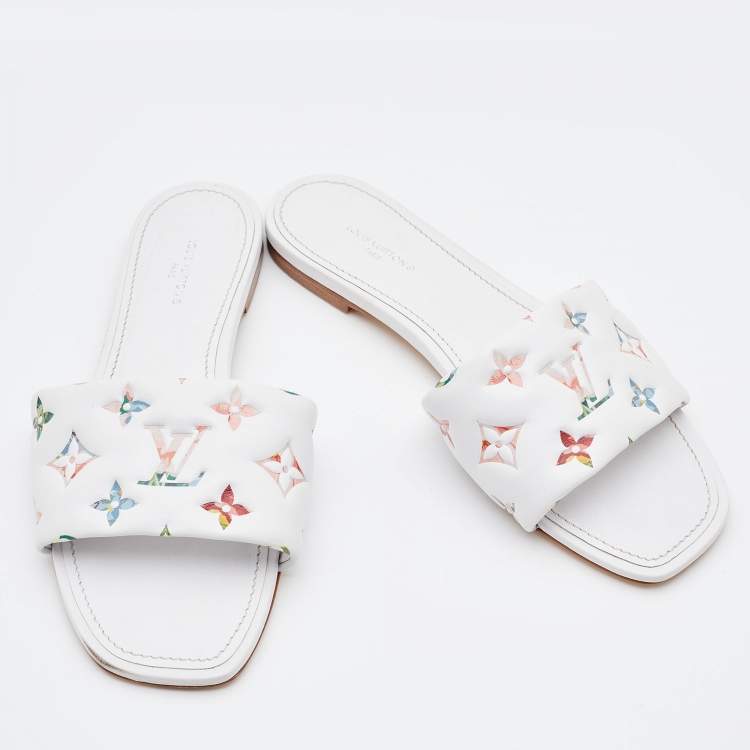 Pre Owned Louis Vuitton White Monogram Embossed Leather Revival Flat Slides Size 38