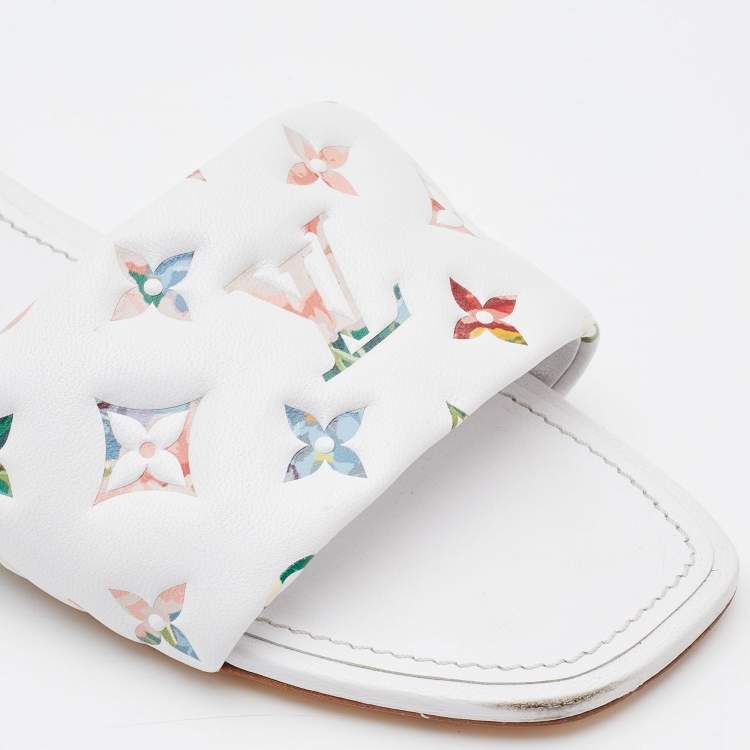 Pre Owned Louis Vuitton White Monogram Embossed Leather Revival Flat Slides Size 38