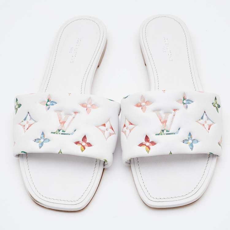 Pre Owned Louis Vuitton White Monogram Embossed Leather Revival Flat Slides Size 38