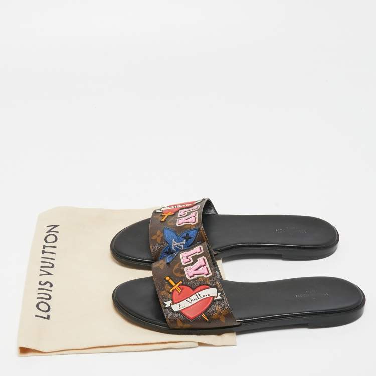 Pre Owned Louis Vuitton Brown Canvas Love Logo Slide Flats Size 38