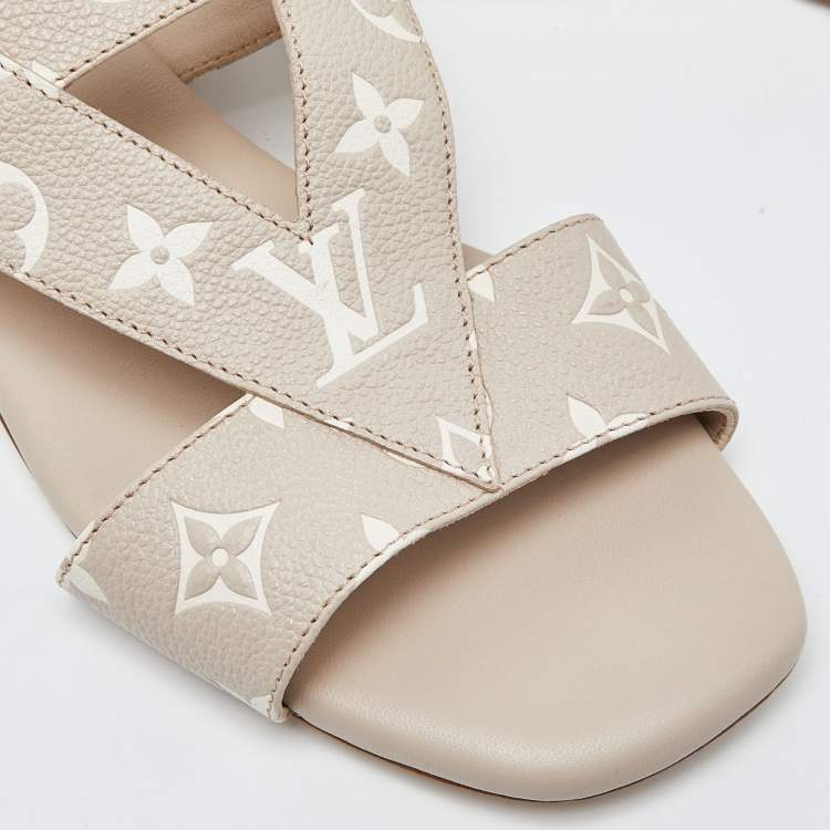 Pre Owned Louis Vuitton Beige/White Monogram Embossed Leather Flat Slides Size 40