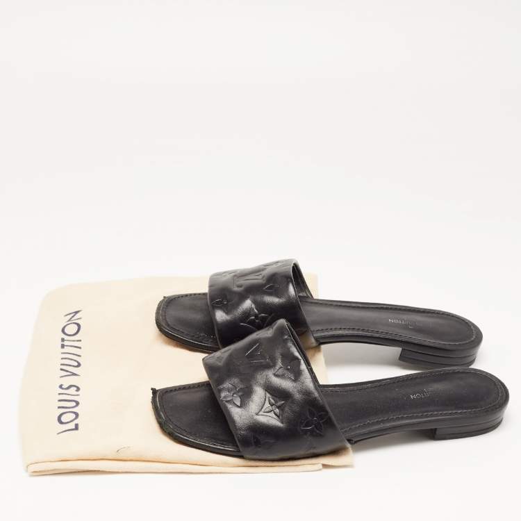 Pre Owned Louis Vuitton Black Monogram Embossed Leather Revival Flat Slides Size 37.5