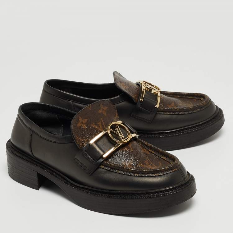 Pre Owned Louis Vuitton Brown/Black Monogram Canvas and Leather Loafers Size 38.5