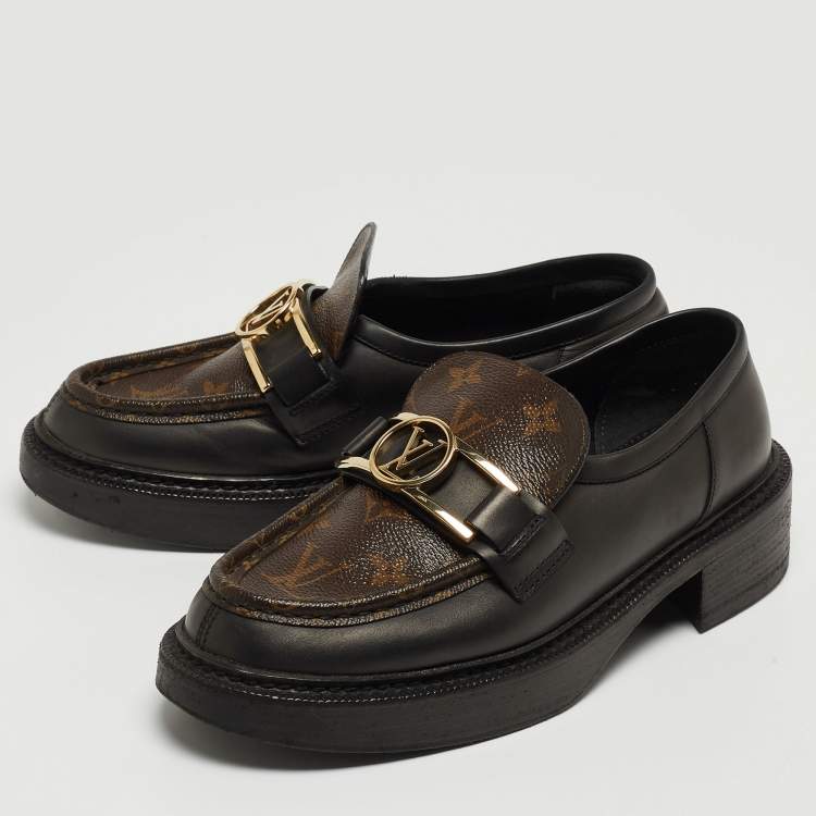 Pre Owned Louis Vuitton Brown/Black Monogram Canvas and Leather Loafers Size 38.5