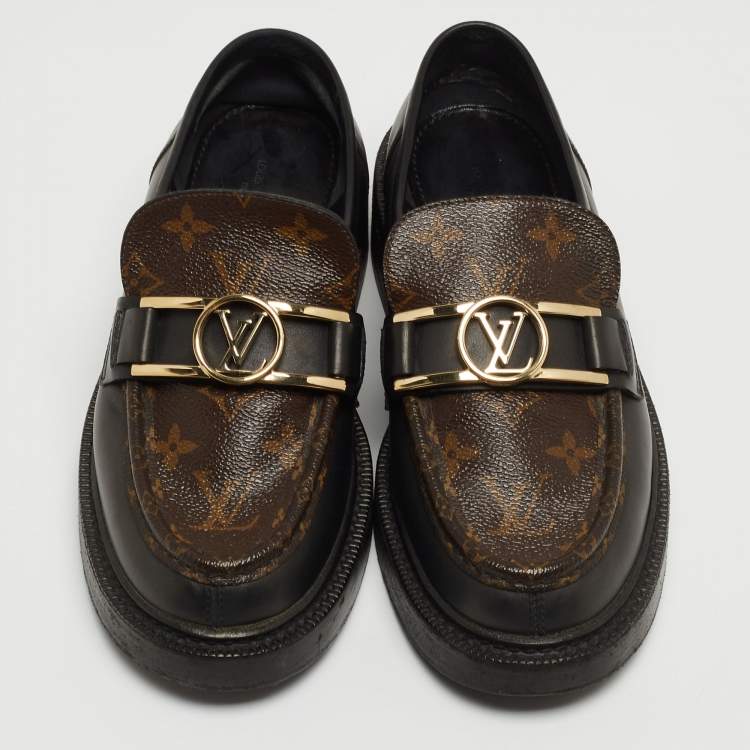 Pre Owned Louis Vuitton Brown/Black Monogram Canvas and Leather Loafers Size 38.5