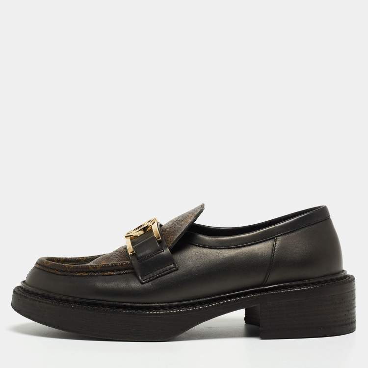 Pre Owned Louis Vuitton Brown/Black Monogram Canvas and Leather Loafers Size 38.5