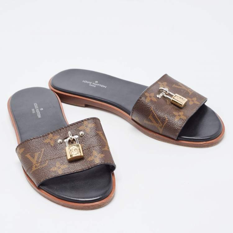 Pre Owned Louis Vuitton Brown Canvas Lock It Flat Slides Size 36 
