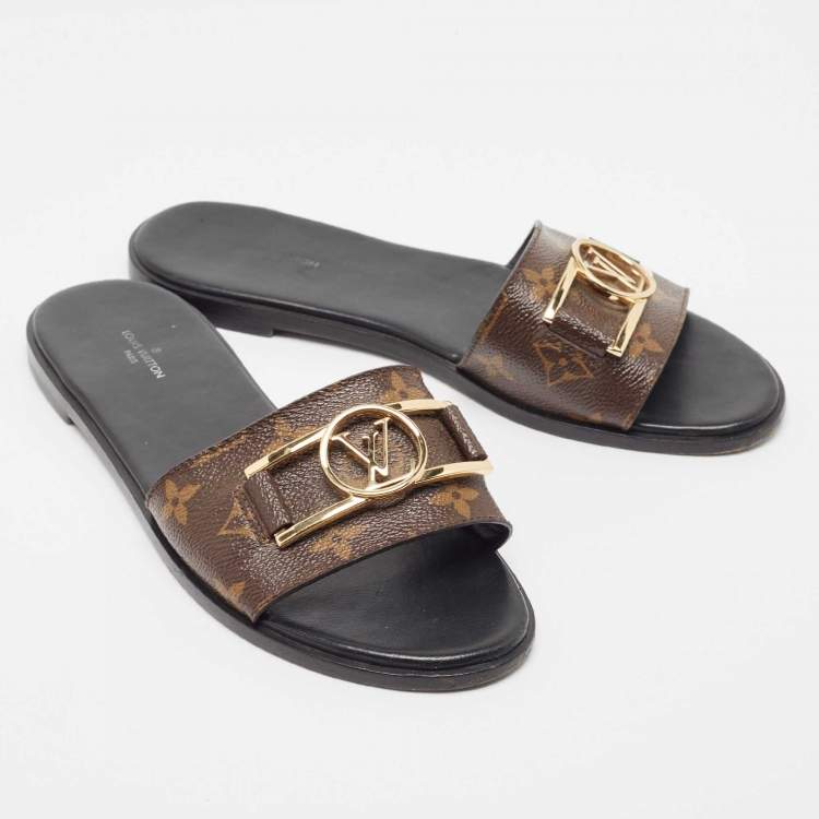 Pre Owned Louis Vuitton Brown Monogram Canvas Lock It Flat Slides Size 39