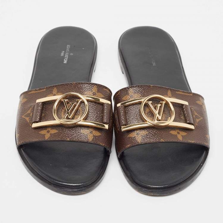 Pre Owned Louis Vuitton Brown Monogram Canvas Lock It Flat Slides Size 39