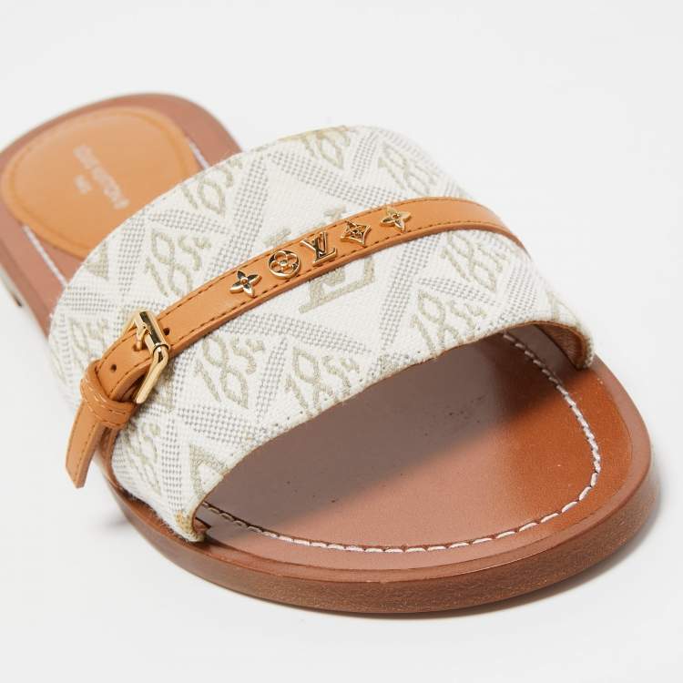 Pre Owned Louis Vuitton White Canvas And Leather Lock It Flat Slides Size 37.5