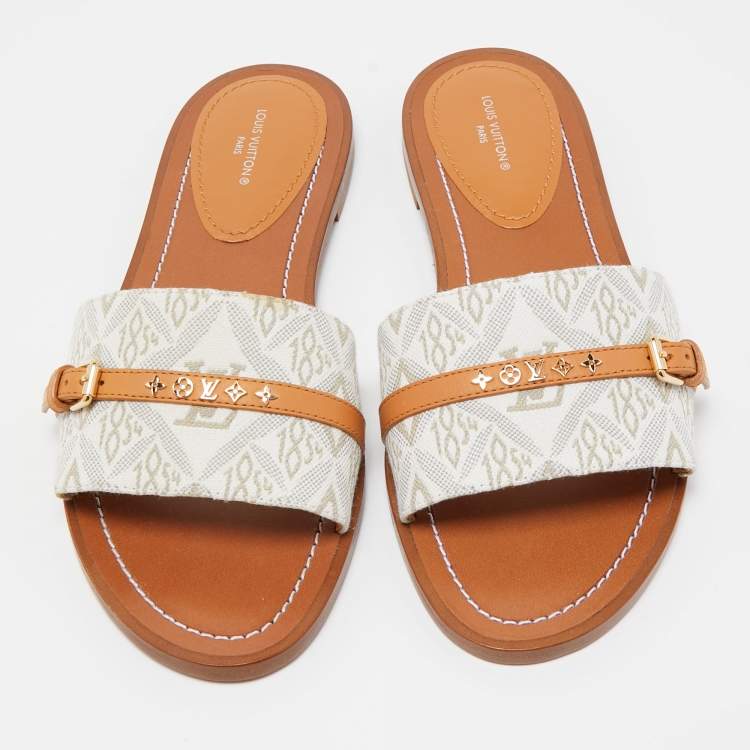 Pre Owned Louis Vuitton White Canvas And Leather Lock It Flat Slides Size 37.5