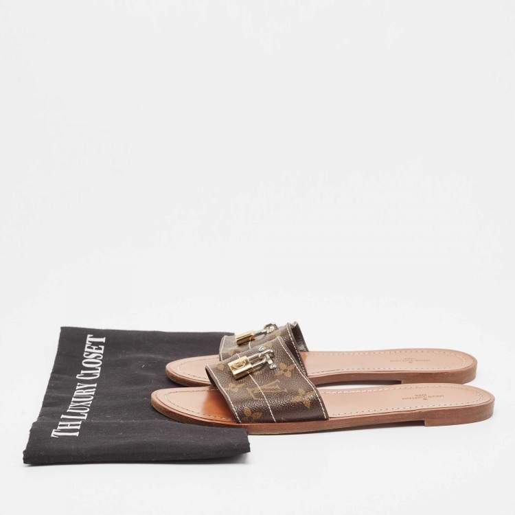 Pre Owned Louis Vuitton Brown Monogram Canvas Lock It  Flat Slides Size 37.5